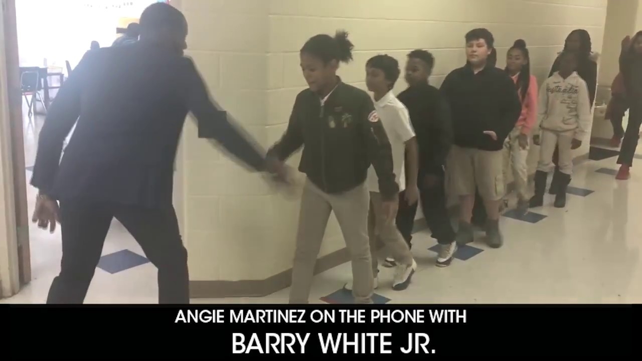 Angie Martinez Tracks Down "Handshake Teacher" Salutes Him Live On Air