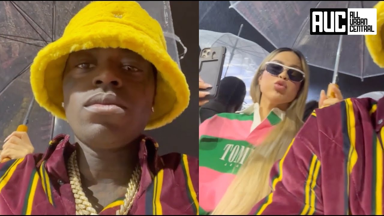 Kodak Black Makes Lady Hold Umbrella While Watching Fashion Show In The Rain