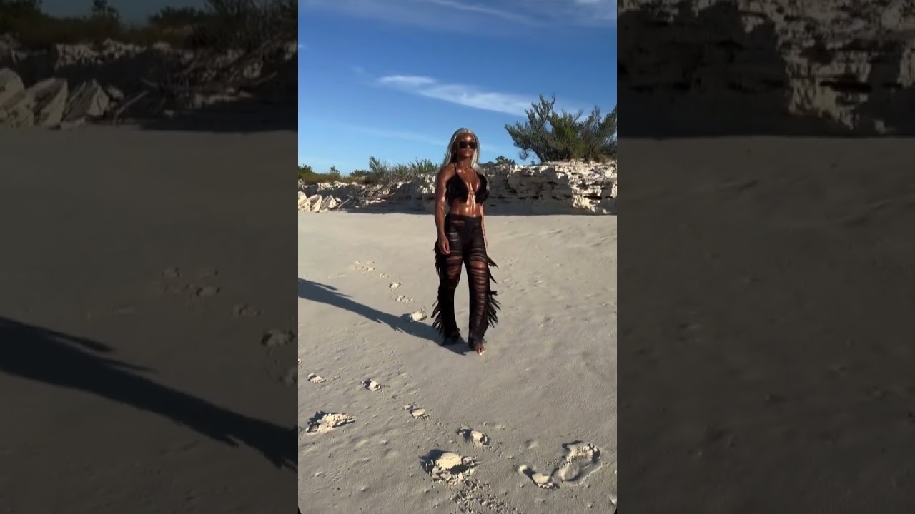 Jade Cargill is oiled up and looking jacked on the beach