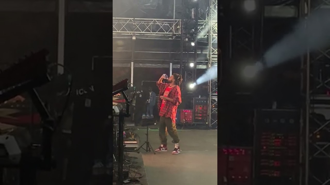 J.Cole Taking A Water Break Mid Set While Crowd Goes Wild