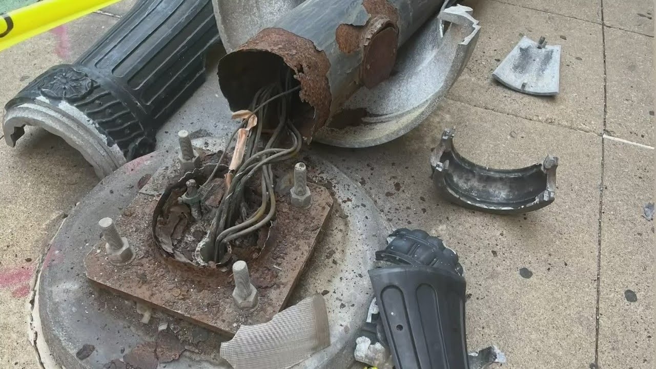 Rusted light pole crashes down in the Loop