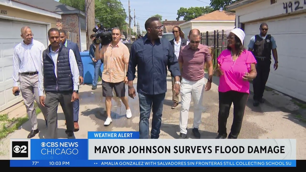 Mayor Johnson surveys West Side flood damage