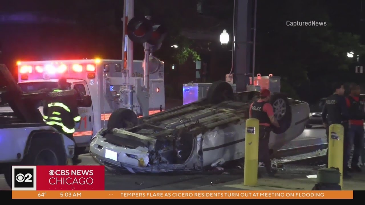 Car hits pole, flips over on Metra tracks in South Shore