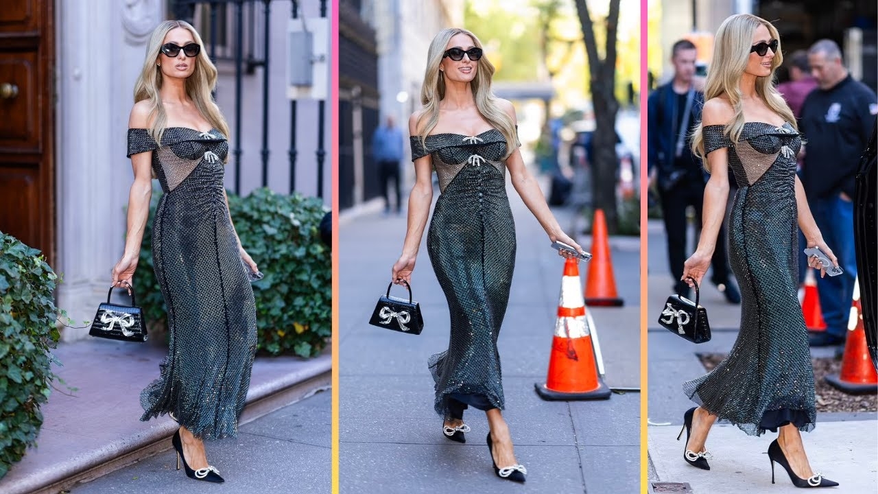 Paris Hilton looks chic in a shiny black dress as she strolls through the Upper East Side...