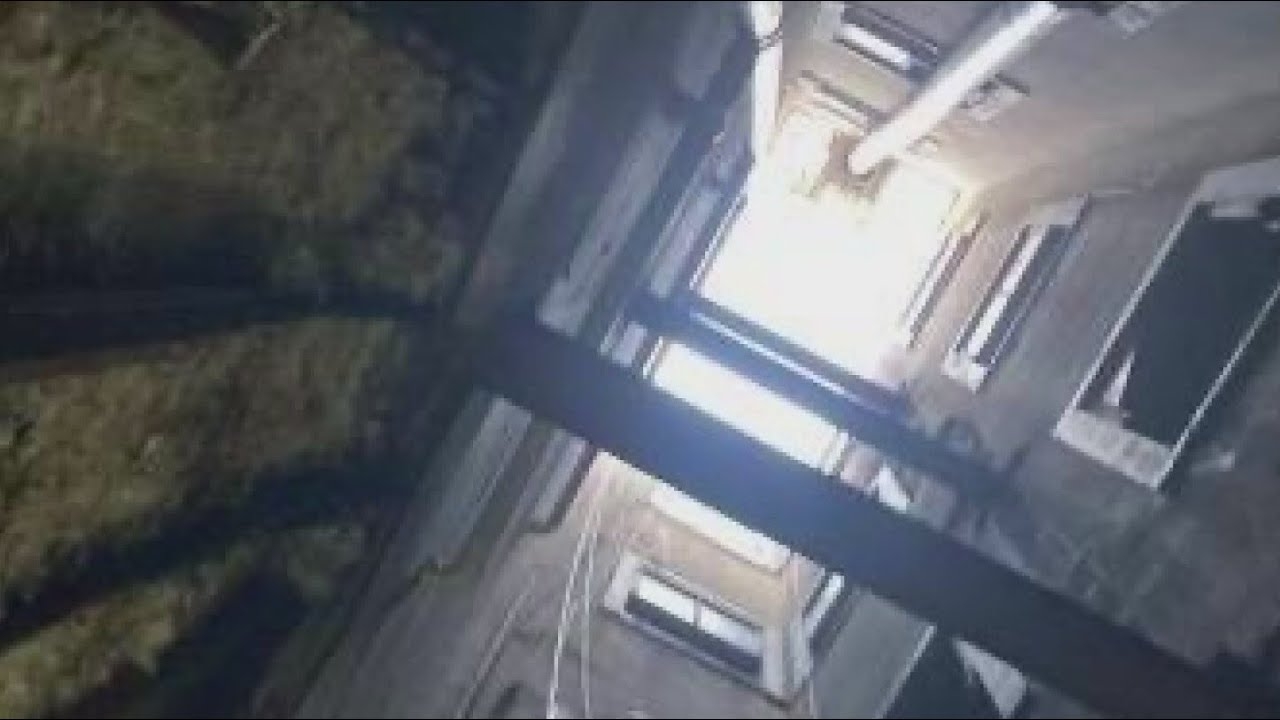 Photo shows shaft down which firefighter fell while battling blaze, later dying