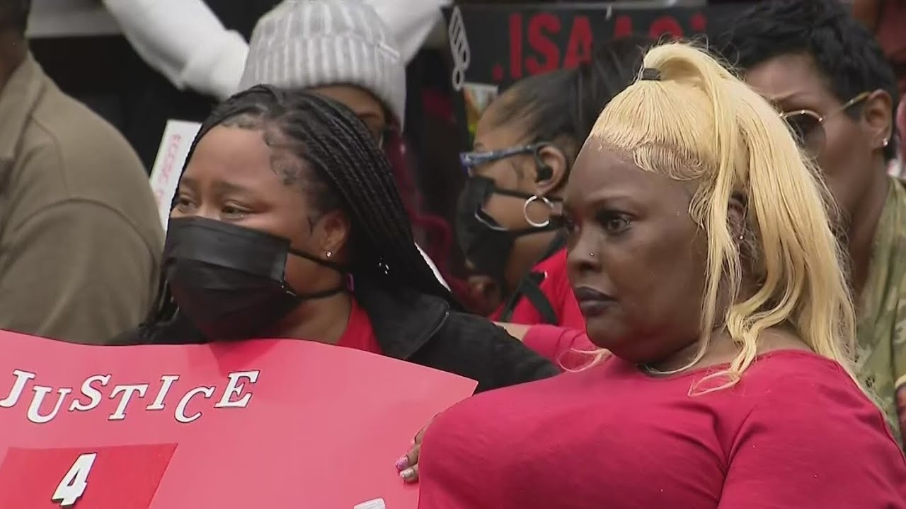 Family of Isaac Goodlow protests during Carol Stream village board meeting