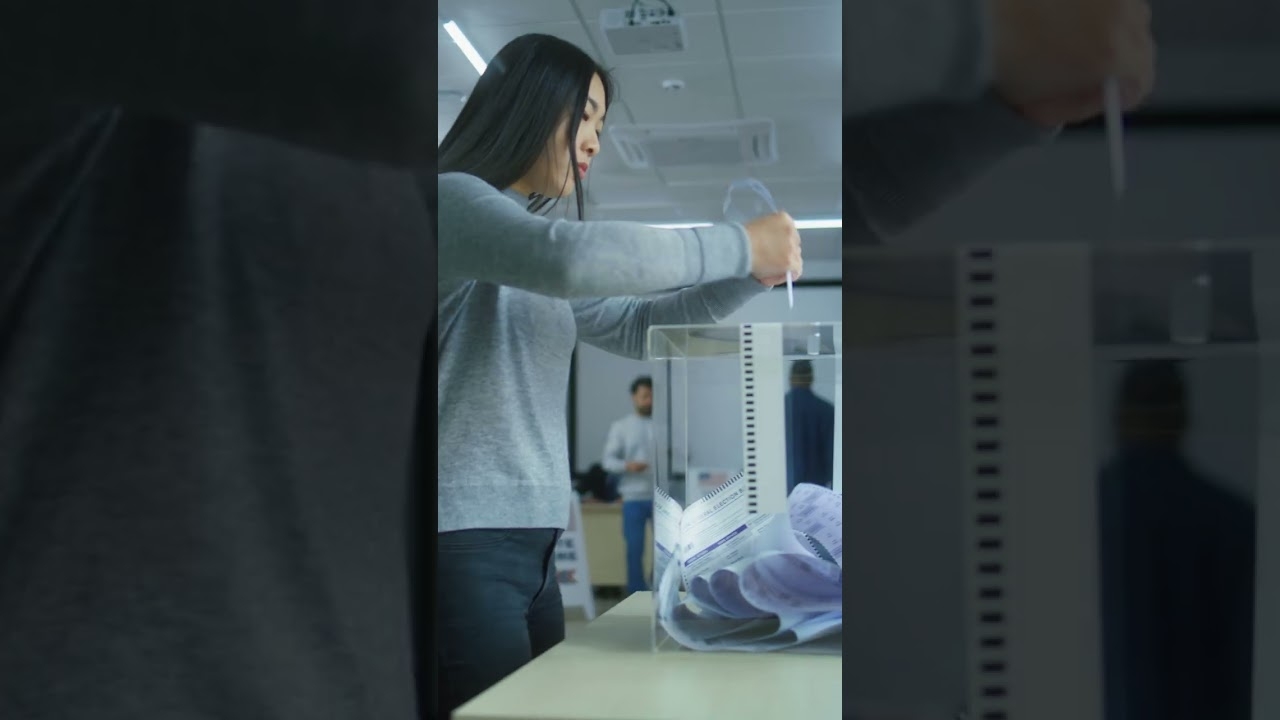Asian woman and african american female military voting