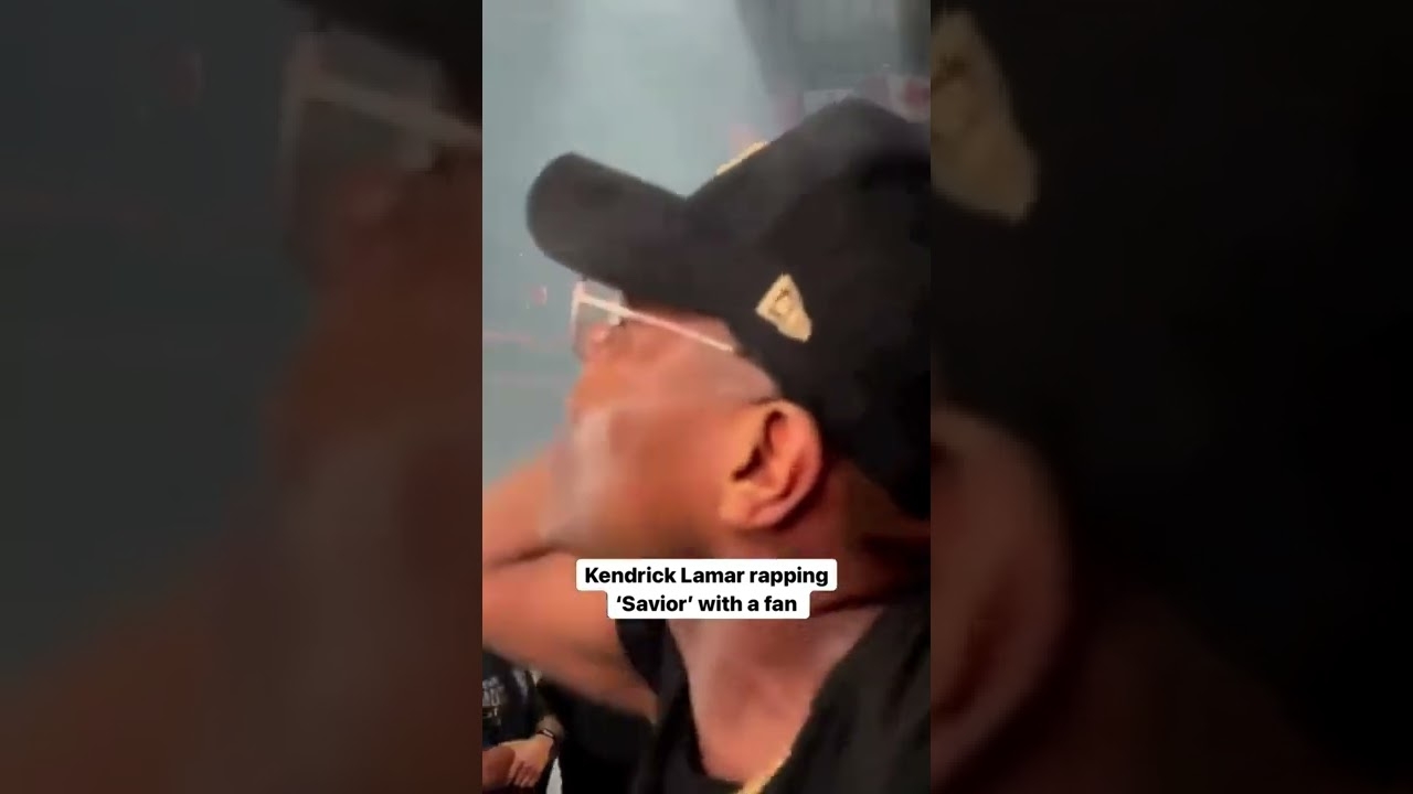 Kendrick Lamar rapping Savior with a fan